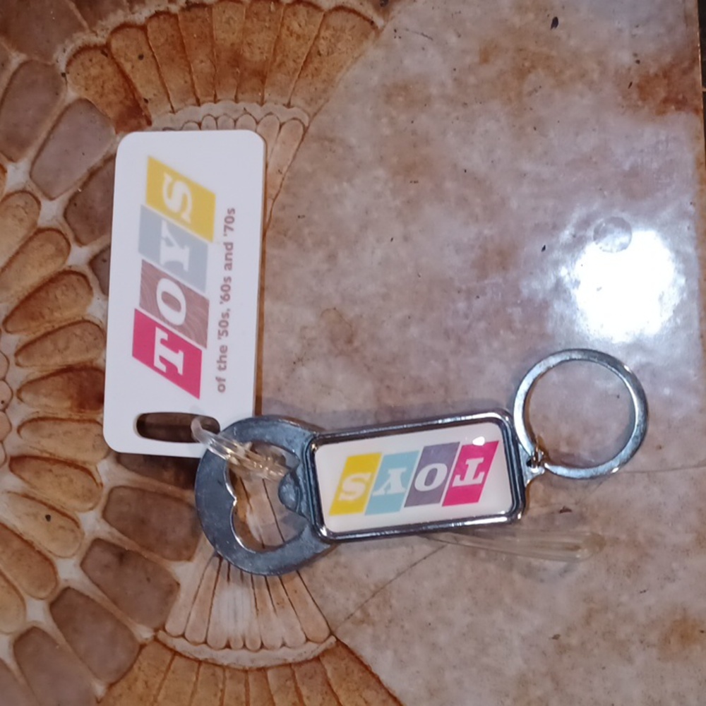 Luggage tag and key chain bottle opener